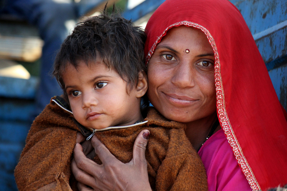  A beautiful Indian mother with her son. © Greta Gabaglio | Dreamstime