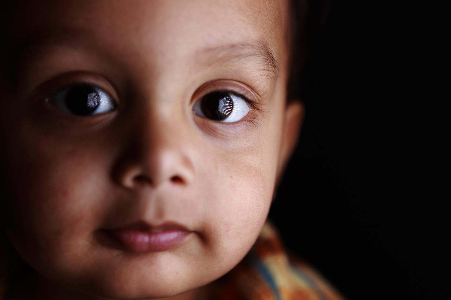 Two-year-old East Indian boy looks forward to a hopeful future.
