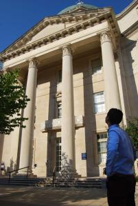 Alex looks toward at the grand entranceway to Yale's Sterling Hall of Medicine