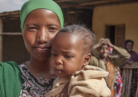 Muslim woman poses with her baby in Harar, Ethiopia