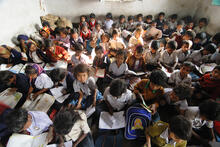 Jharia, India —Children receive education with the help of an NGO (2013). (Photo 28999858 © Samrat35 | Dreamstime.com)